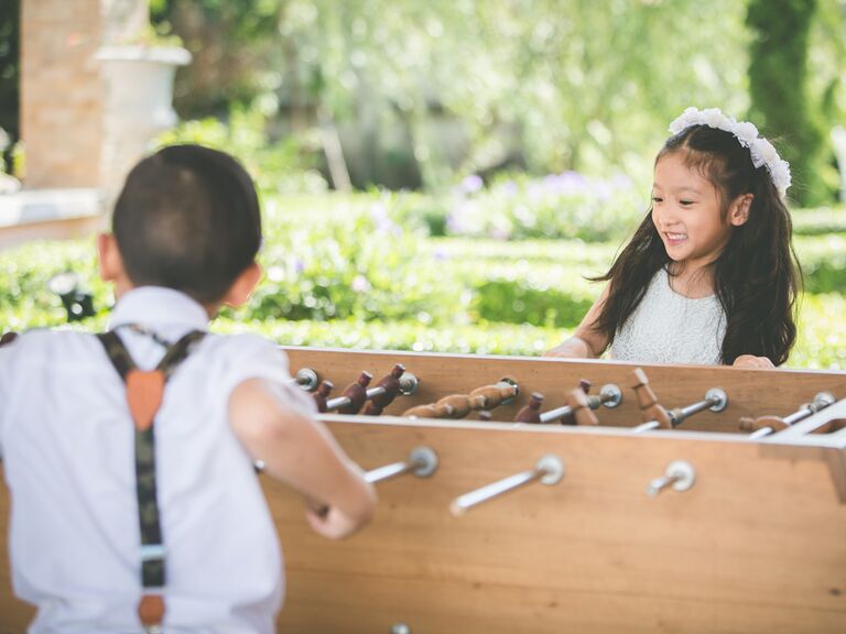 Kids playing foosball at weddings