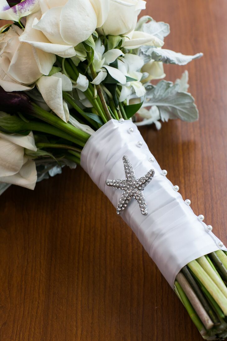 A starfish motif was used throughout the day's decor—from the invitations to the bride's bouquet.