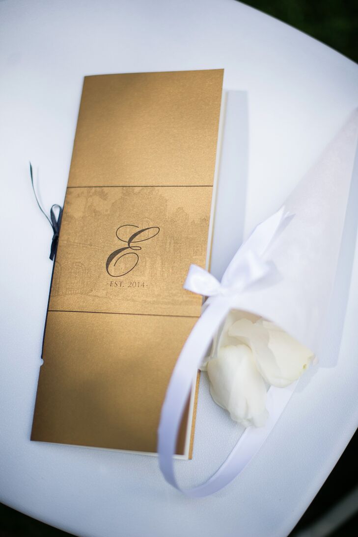 The booklet ceremony programs were bound with a gold leaf card stock and embellished with the couple's monogram.