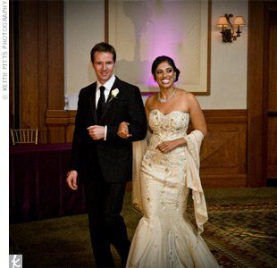 The detailed embroidery on Harini's custom-made mermaid gown, which combined Western style and Eastern flair, sparkled during the couple's grand entrance.