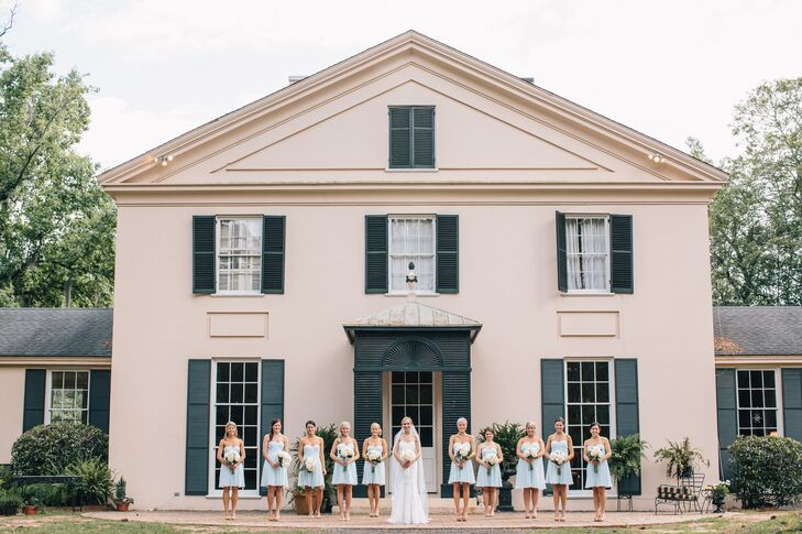 The bridesmaids wore Ann Taylor's silk georgette strapless dress in soft blue with nude heels.