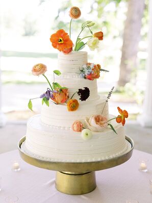 Four-Tier, White Wedding Cake With Fresh-and-Colorful Spring Flowers