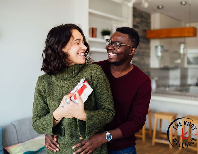 Man presenting gift to his partner