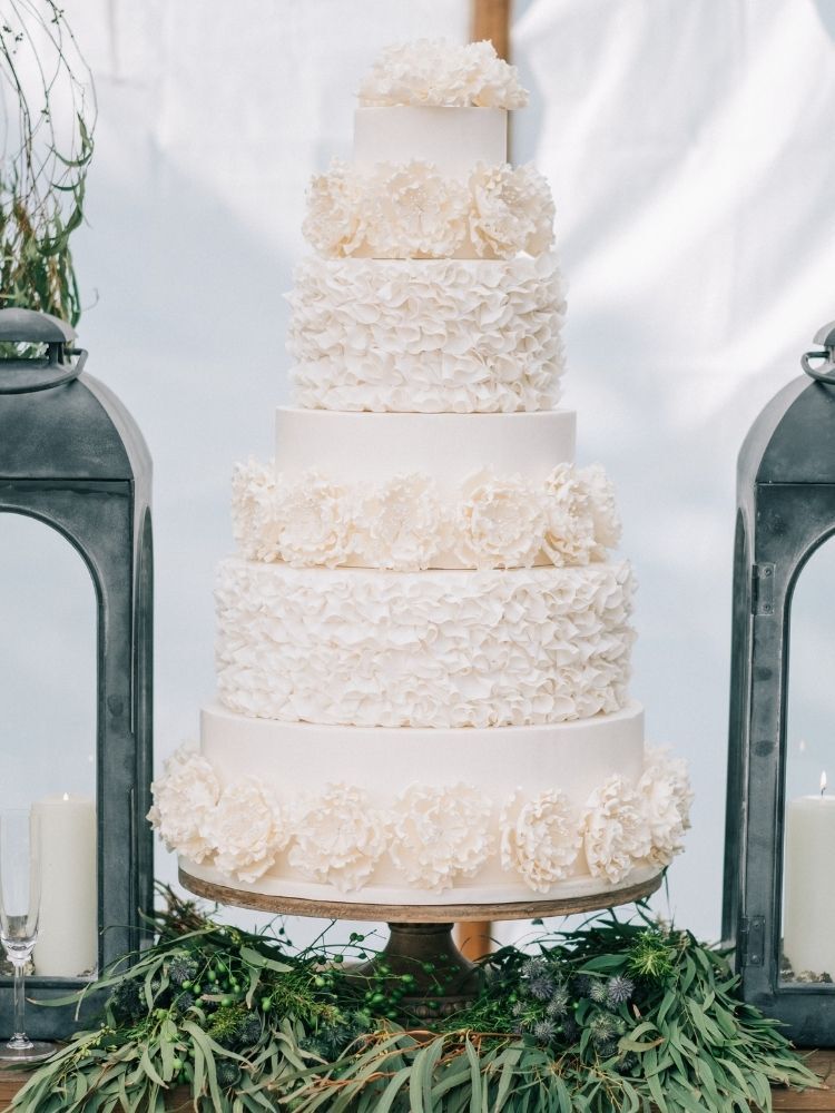 white ruffled wedding cake
