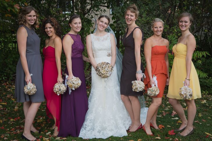 Erin-Joy let her bridesmaids pick their own dresses under one condition: She got to pick the color. The result was a fabulous array of fall-colored dresses, adding a pop of color to the wedding party.