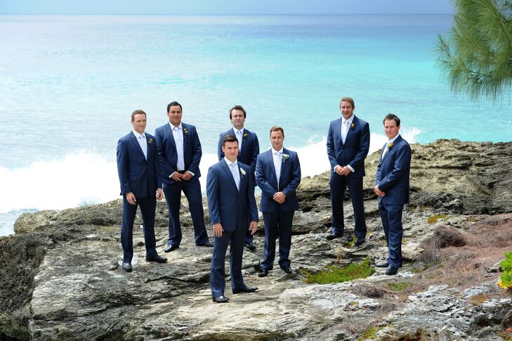 The scenic, historic venue overlooked the amazing turquoise sea that surrounds the Cayman Islands. Groomsmen posed on the rocky cliffs overlooking the stunning views.