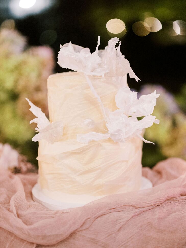 Two-Tier White Wedding Cake With Faux Fabric Floral Details