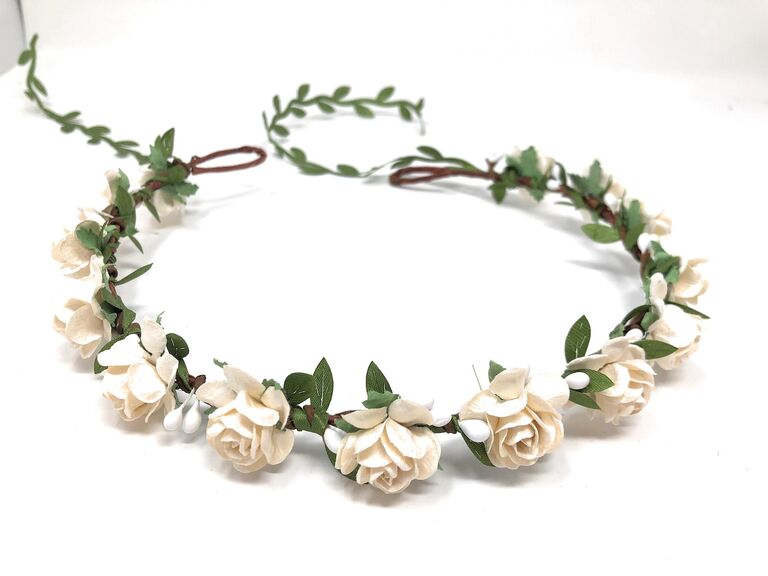 Beautiful flower crown featuring white roses and green leaves. 