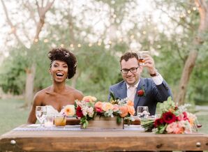 Couple Raising Traditional Toast at Outdoor Reception