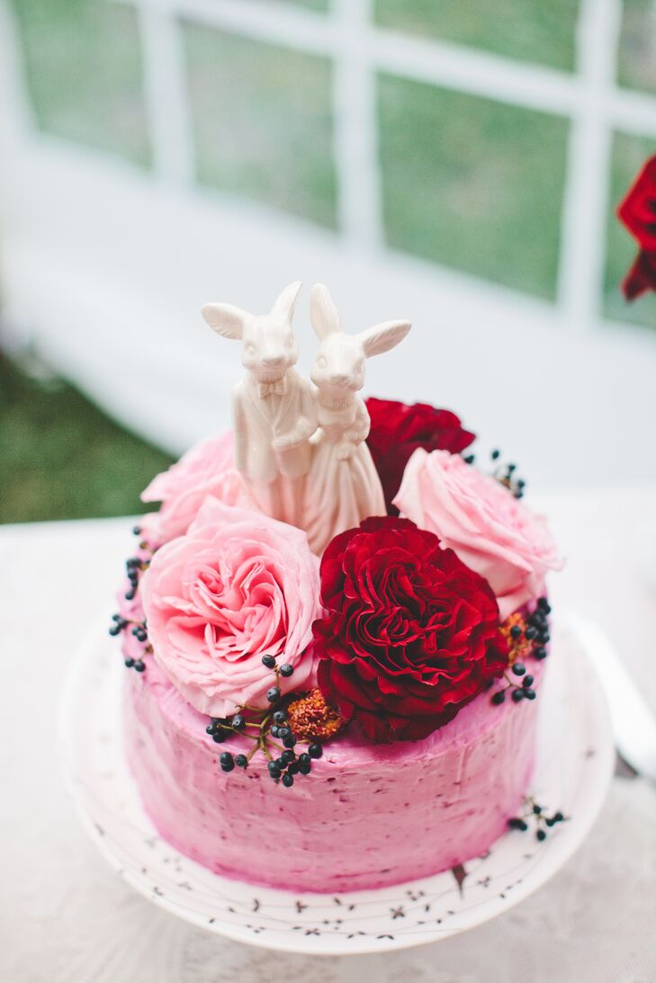 The couple served cupcakes to guests, but cut into a vegan, beet-based cake with sweet beet frosting and topped with a custom ceramic topper.