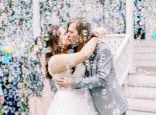 College sweethearts Nathalee (Nat) Deya and Bray Miller memorialized their love with a sweet, al fresco wedding at Savannah Botanical Gardens on a sun