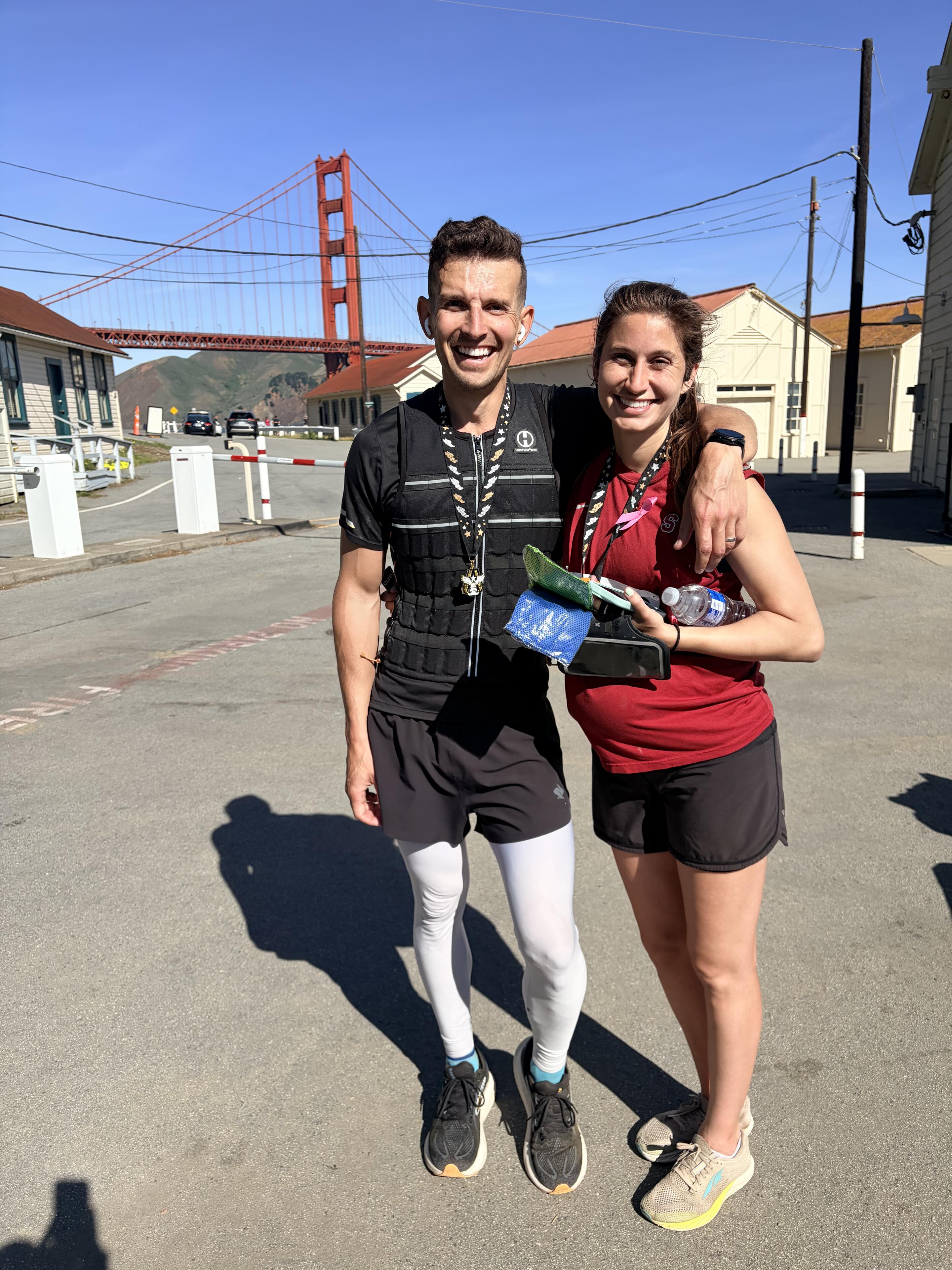 3/3 trimesters of pregnancy half marathons complete! Cameron matches Lauren's baby weight by wearing a 20 lb weight vest!