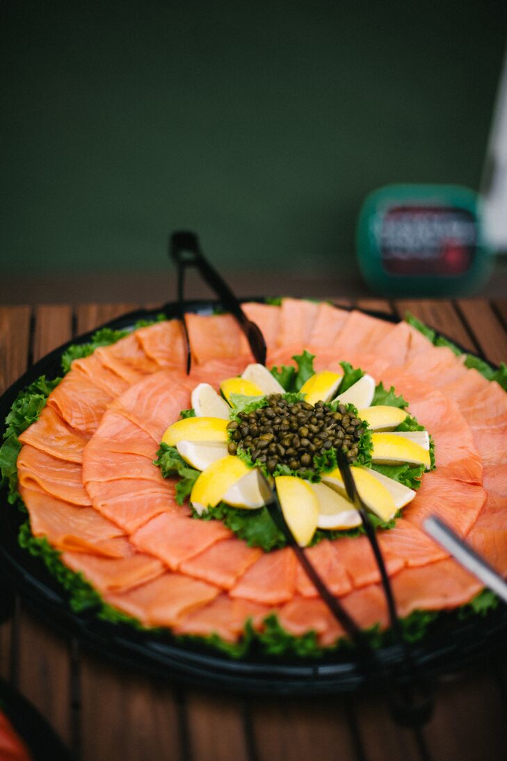 Fresh lox purchased from the couple's favorite bagel store was served on a platter, with lemons and capers in the middle. Bagels and cream cheese were also available for pairing, as well as several other brunch items and champagne.