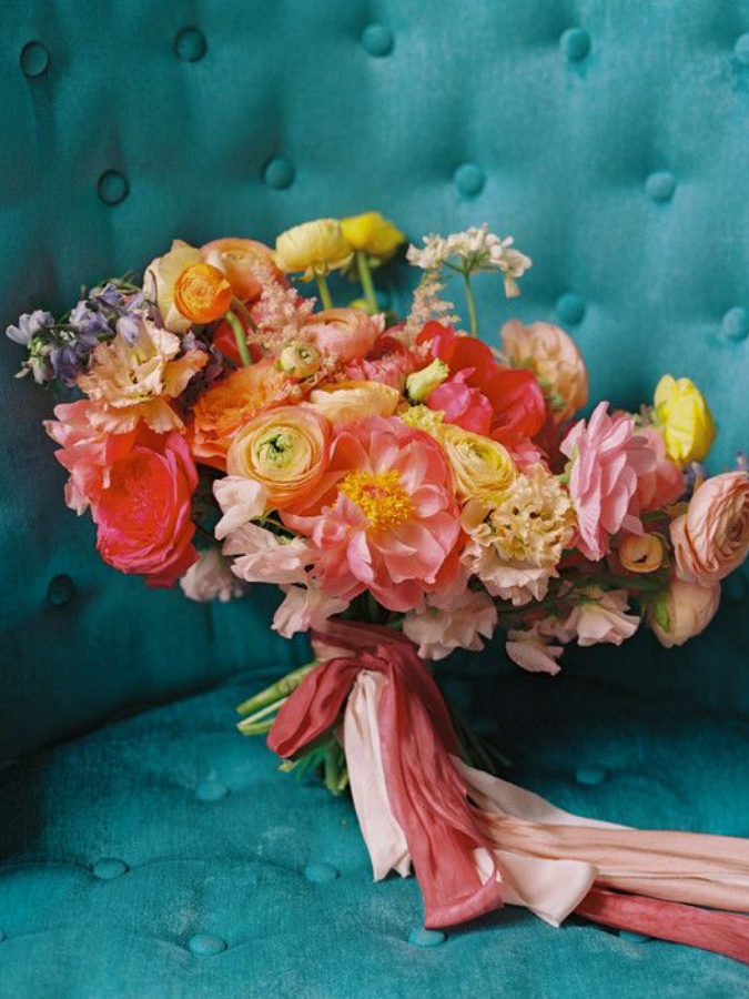 Orange-and-yellow bouquet with ribbon