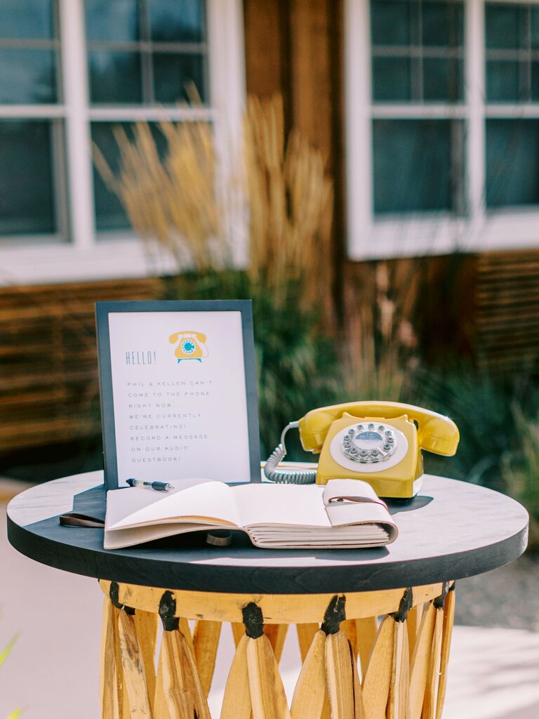 2023 wedding reception trend with vintage yellow rotary phone