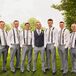 Each of the groomsmen wore gray pants with navy, oxford shoes along with a light gray tie and navy suspenders from Banana Republic.