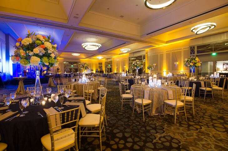 The traditional ballroom reception took place in Buckhead, Georgia at The Grand Hyatt Hotel with a cobalt blue, ivory and green color palette.