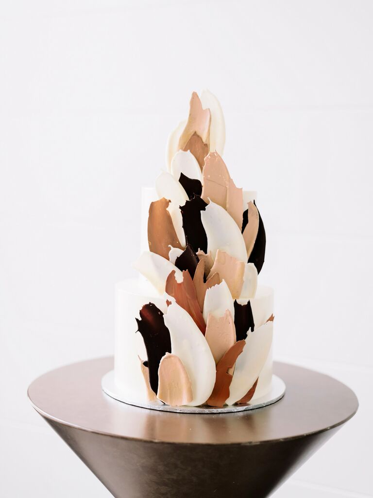modern fall wedding cake with 3D brushstroke details in dark brown, beige and white