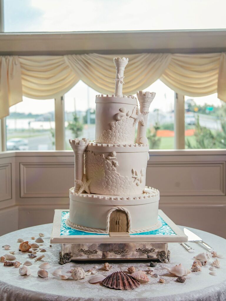 Sandcastle-inspired beach-themed wedding cake