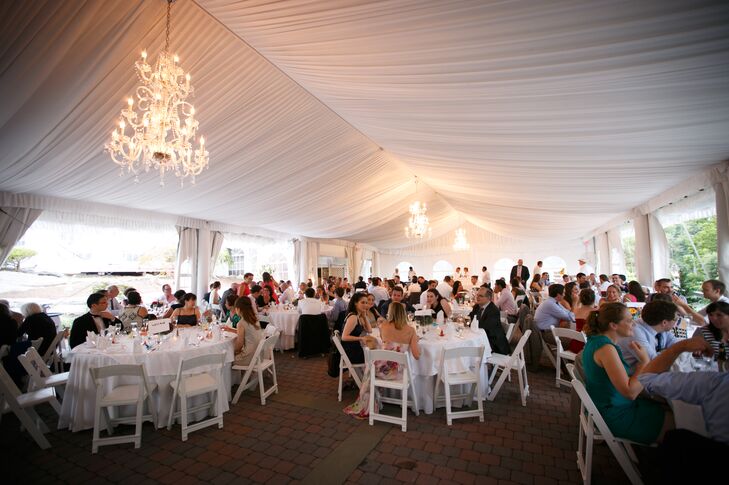 The reception took place outdoors beneath a large, billowy tent. It’s decor was all white, aside from the vibrant pops of color in all the shades of the rainbow.