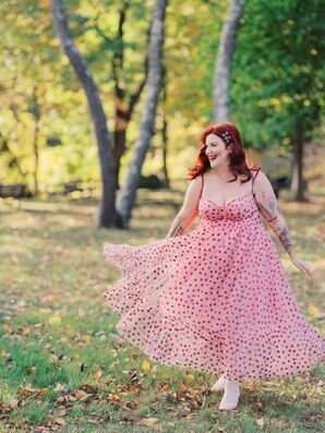 Bride in Pink Dress With Red Hearts, Boots Spins & Smiles in Fall Foliage