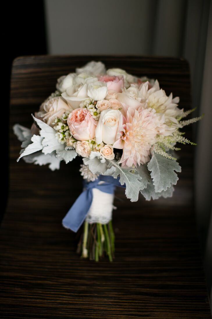 "I had a swatch from his mechanic shirt cut and wrapped around my bouquet as my 'something blue', and that way he was with me as I walked down the aisle," says Elisa.