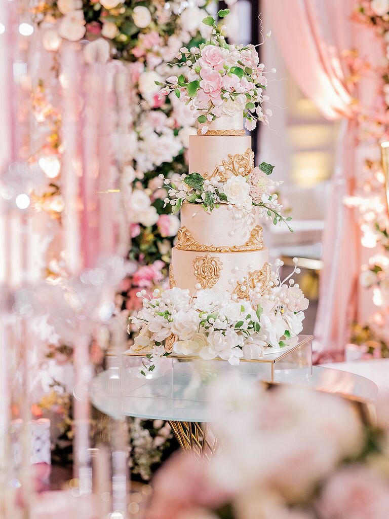Pink and gold fairytale-themed wedding cake