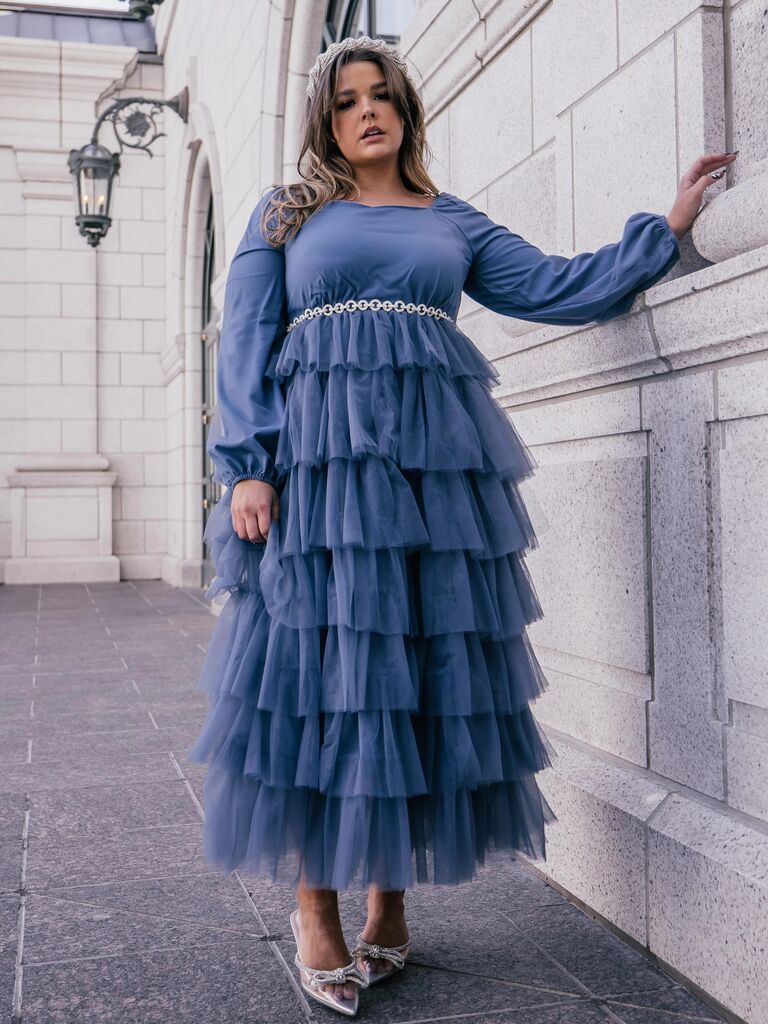 whimsical blue tiered wedding guest dress for spring with embellished waistband