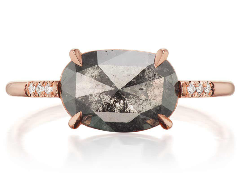 Oval salt and pepper diamond on rose gold band with pave diamonds