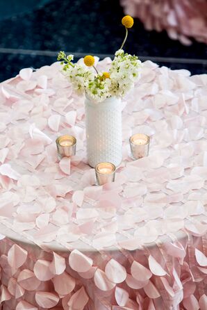 White Centerpiece on Pink Petal Tablecloth