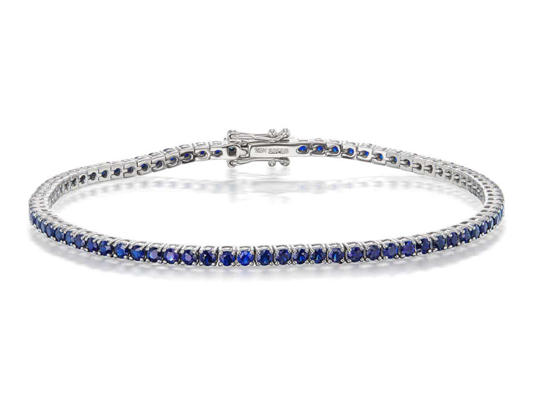 Round blue sapphire tennis bracelet on white gold chain