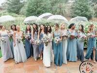 couple walking through open door wedding and how to show grace while wedding planning