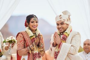 Indian Bride With Ornate Henna, Bangles and Glam Makeup With Groom in Jewel-Adorned Turban