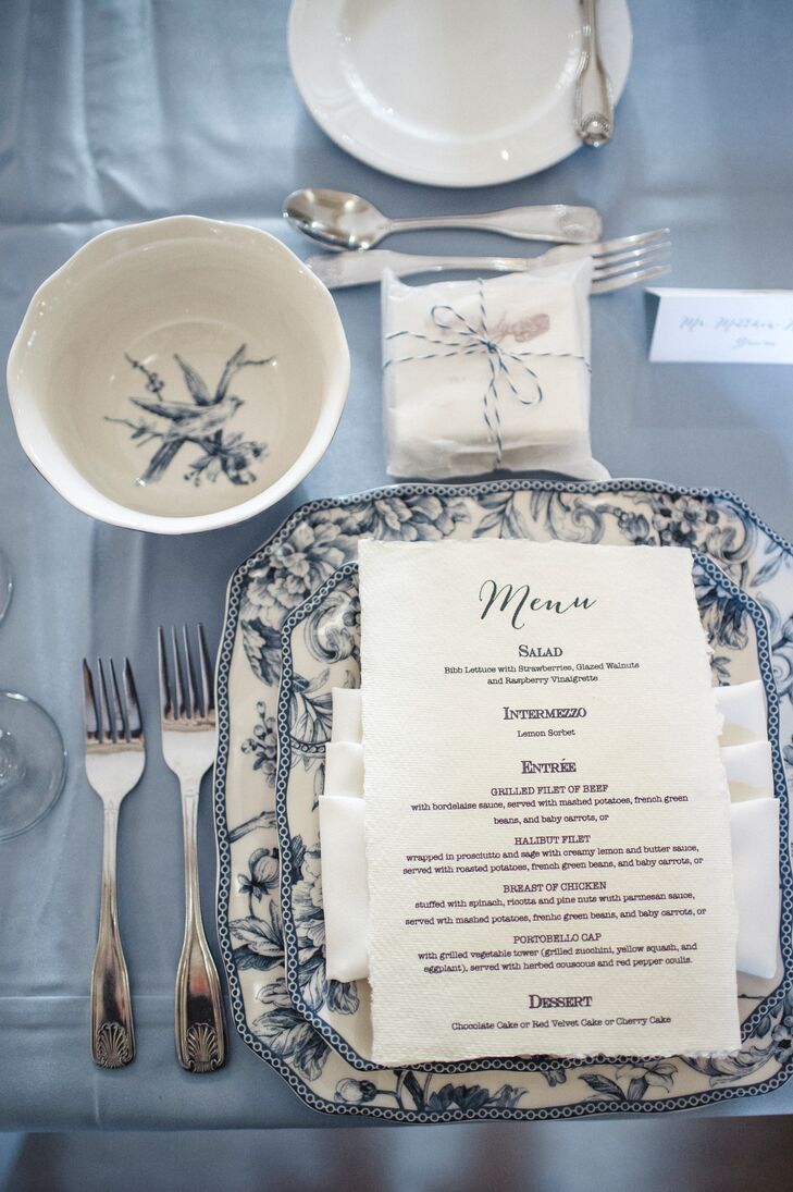 Every guest sat down to a pretty blue and white place setting, complete with a menu listing the courses.