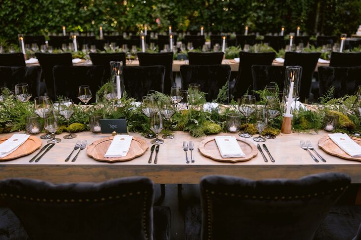 Elegant Tablescape With Wood Chargers and Greenery