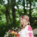 “My sister and best friend participated in the processional. They were free to wear what they wished, but I think they must have secretly coordinated because they both ended up wearing long floral dresses with their hair down and curled,” Nicole says. The girls completed the look with colorful heels and flower crowns that mirrored Nicole’s.