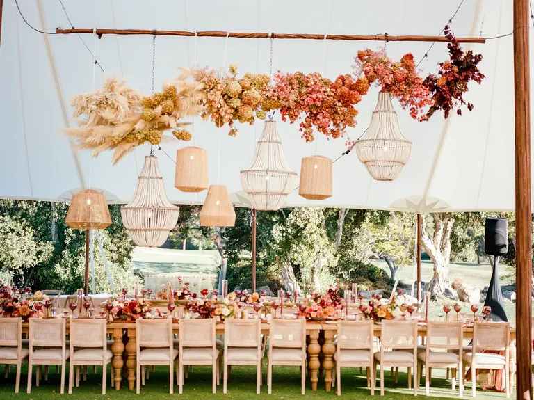Low to High Chandeliers wedding lighting idea
