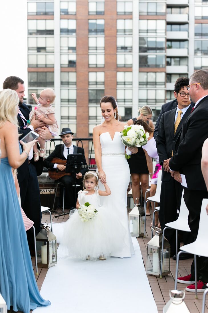 Elegant Bride and Flower Girl Walk Down the Aisle Together