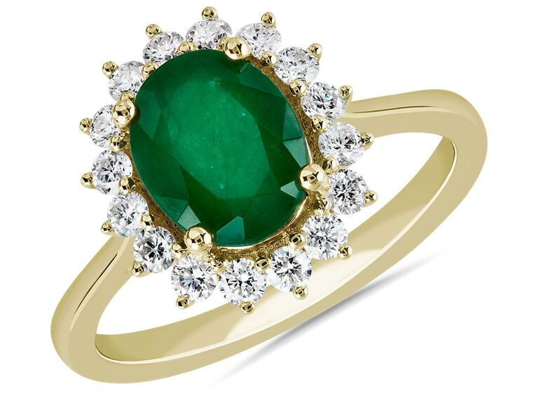 Blue Nile emerald and gold engagement ring. 