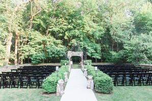 Outdoor Jewish Ceremony With Black Folding Chairs