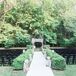 Guests watched from black folding chairs as Tara and Jesse exchanged vows in a ceremony that incorporated Baha'i and Jewish traditions.
