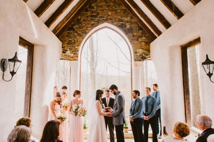 Bride and Groom Holding Hands at Ceremony