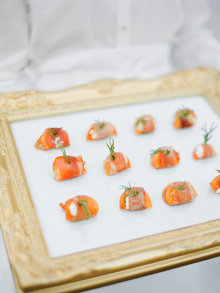 Prosciutto wrapped persimmons with goat cheese wedding reception appetizer