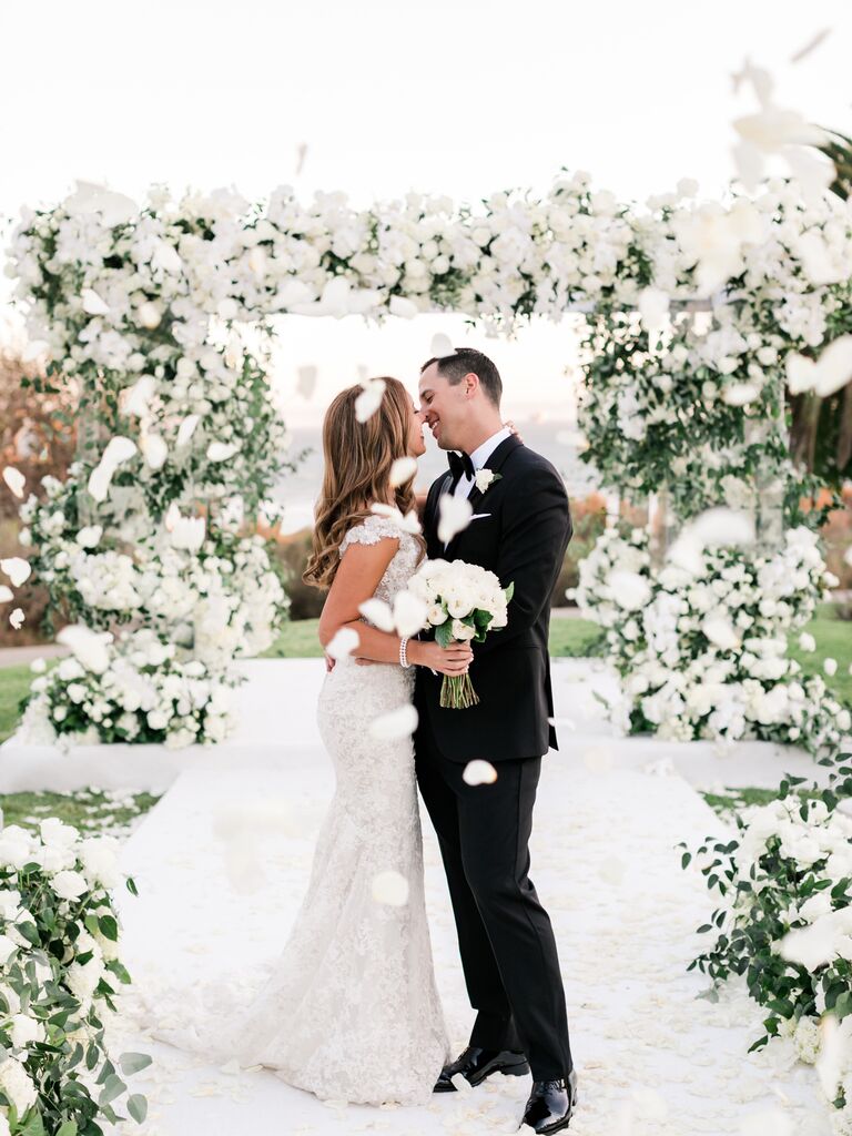 couple kissing with confetti