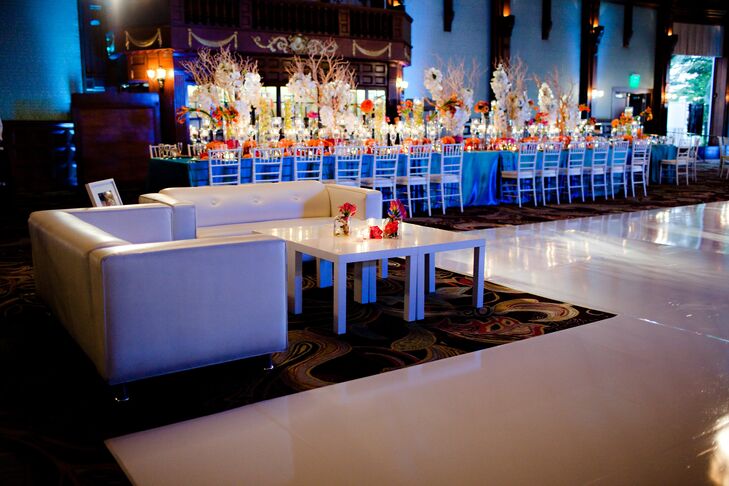 Luxe white-leather couches were set up around the dance floor so guests could take a break from dancing.