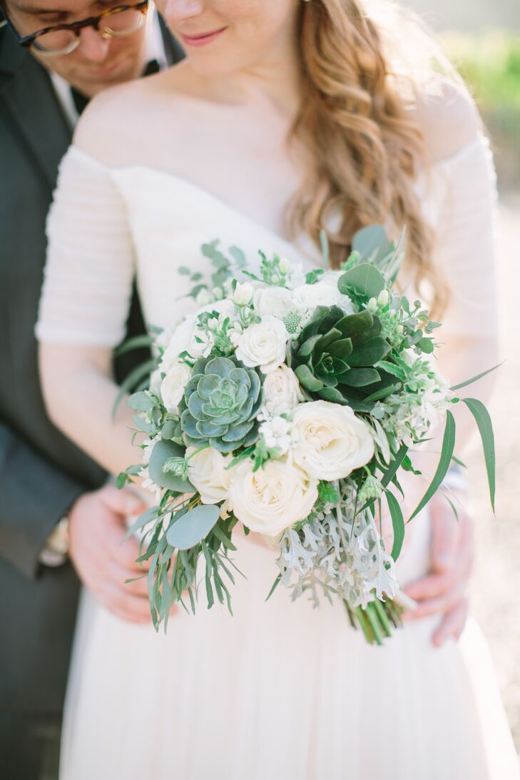 "I wanted my bouquet to be full of plants, not just flowers," says Sloane. "Deep green succulents, dusty miller leaves, eucalyptus, white roses, and hydrangea added texture. My bouquet looked like it had just been scooped up from a wild field."