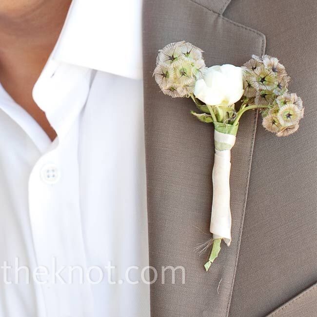 Michael’s boutonniere consisted of scabiosa and ranunculus, which matched Gabrielle’s bouquet and nicely complimented his tan-colored suit.