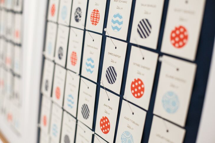 Each escort card had one of the bold patterns that matched the couple’s color scheme and added a modern flair to the reception.