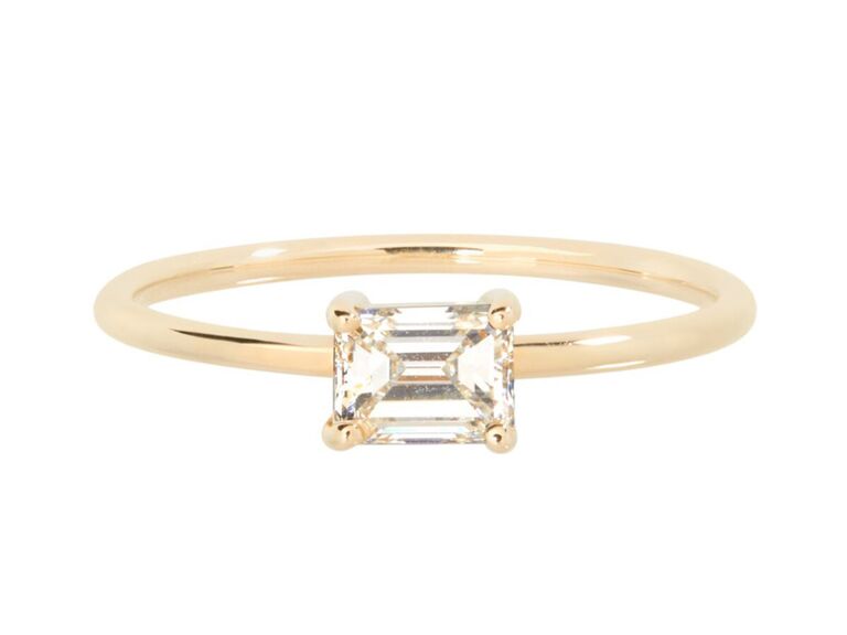 catbird east-west emerald cut diamond engagement ring with plain yellow gold band