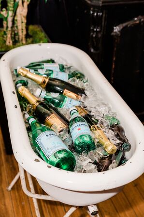 Tub with Champagne and Sparkling Water Bottles